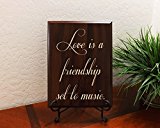 Love is a friendship set to music. Decorative Carved Wood Sign Quote, Faux Cherry